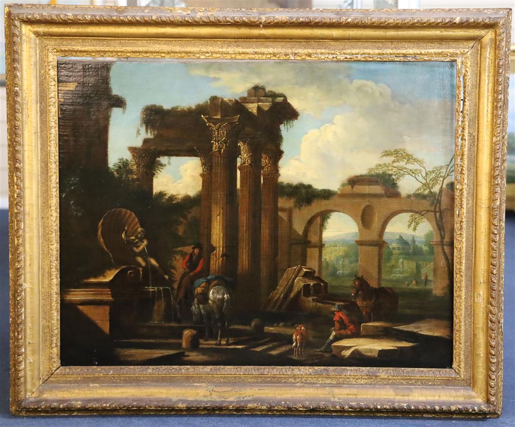 Manner of Giuseppe Zocchi (Italian, 1711-1767) Travellers resting beside a fountain amongst Roman ruins 24 x 30.5in.